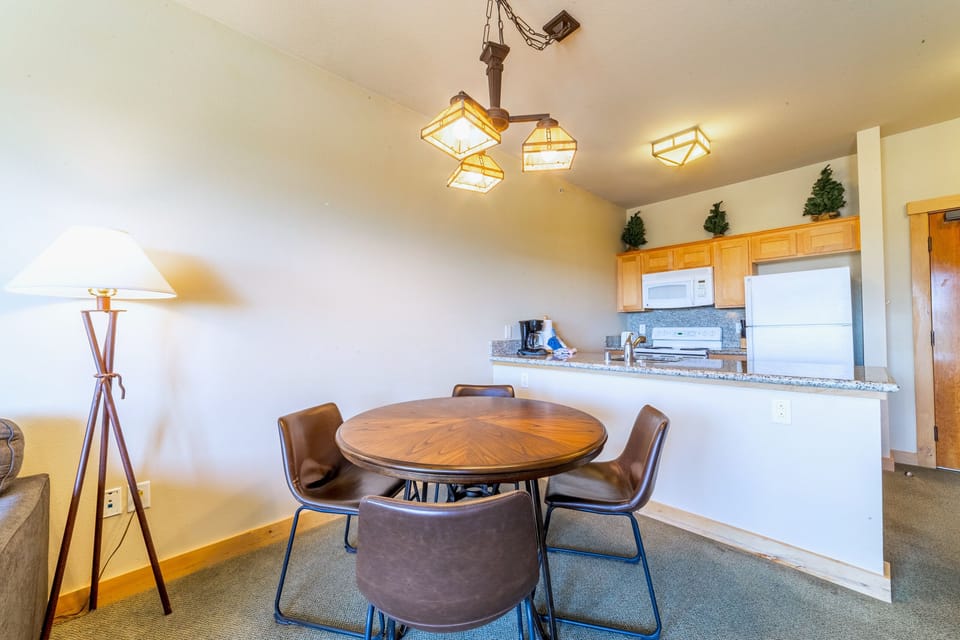 Dining room table with seating for 4.