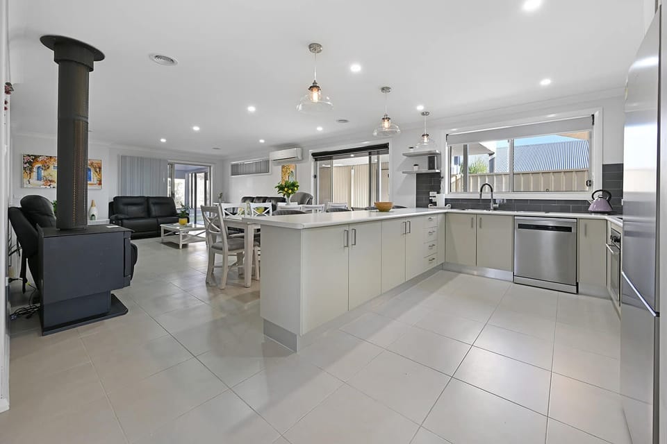 Kitchen + Coffee Machine + Breakfast Bar with Stools