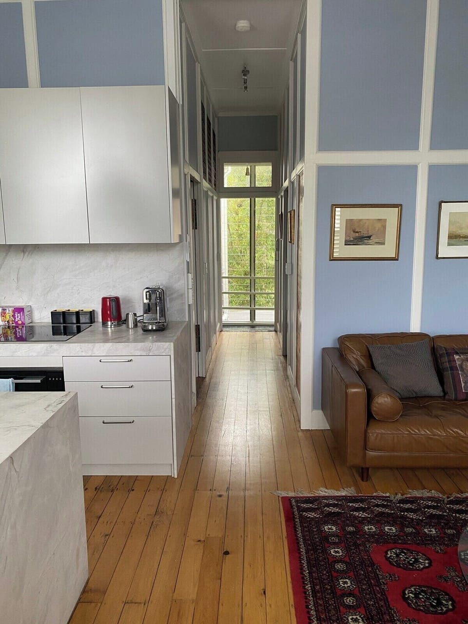 Long view of Hallway facing to back of Apartment
