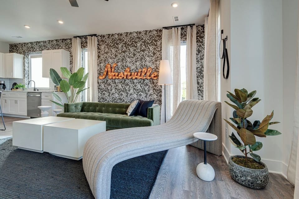 Bright and open living space complete with designer furnishings and smart TV.