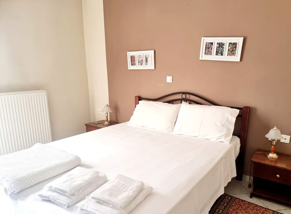 Shower, designer toiletries, hair dryer, towels