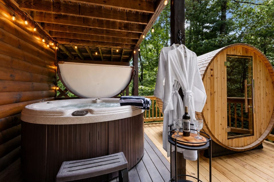 Step out, wrap up, and breathe in the mountain air - the hot tub & cedar sauna!