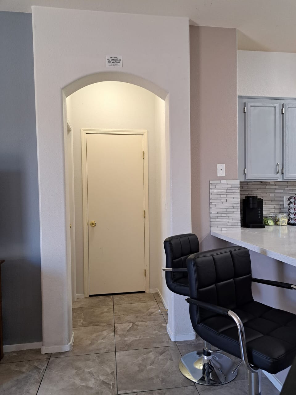 The view from the kitchen leads towards the master's bedroom.