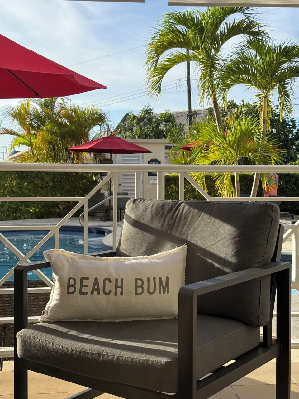     Morning coffee with pool views and tropical sunshine