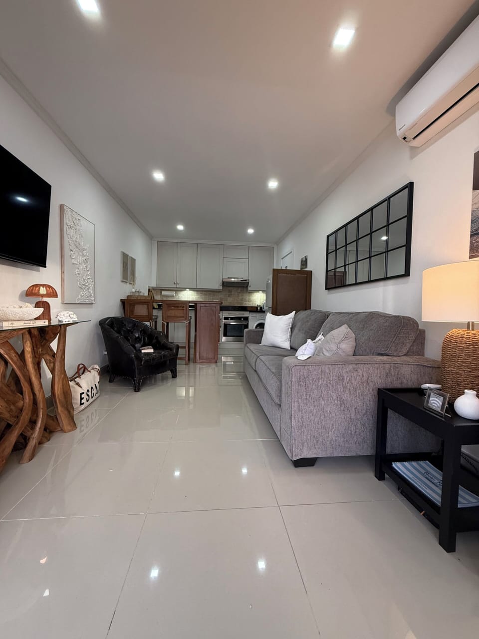     Spacious open-plan living with fully equipped kitchen
