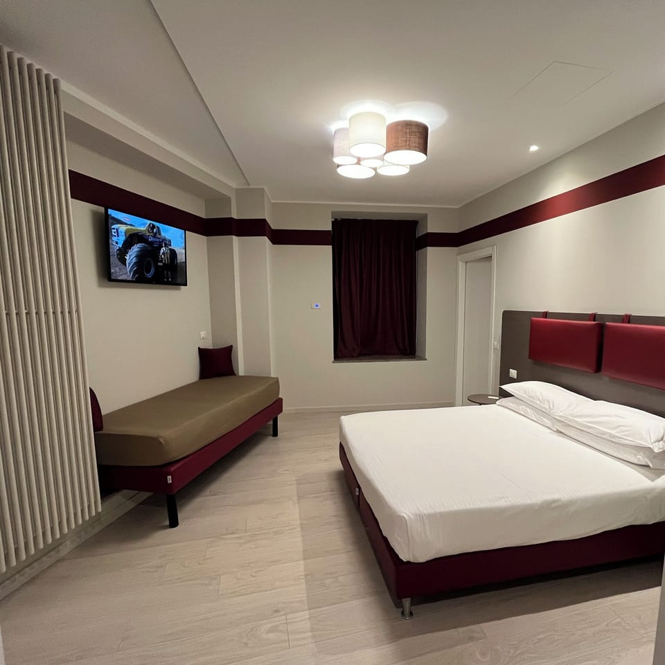 Deluxe Room, 1 Queen Bed with Sofa bed, Non Smoking | Free minibar items, in-room safe, free WiFi