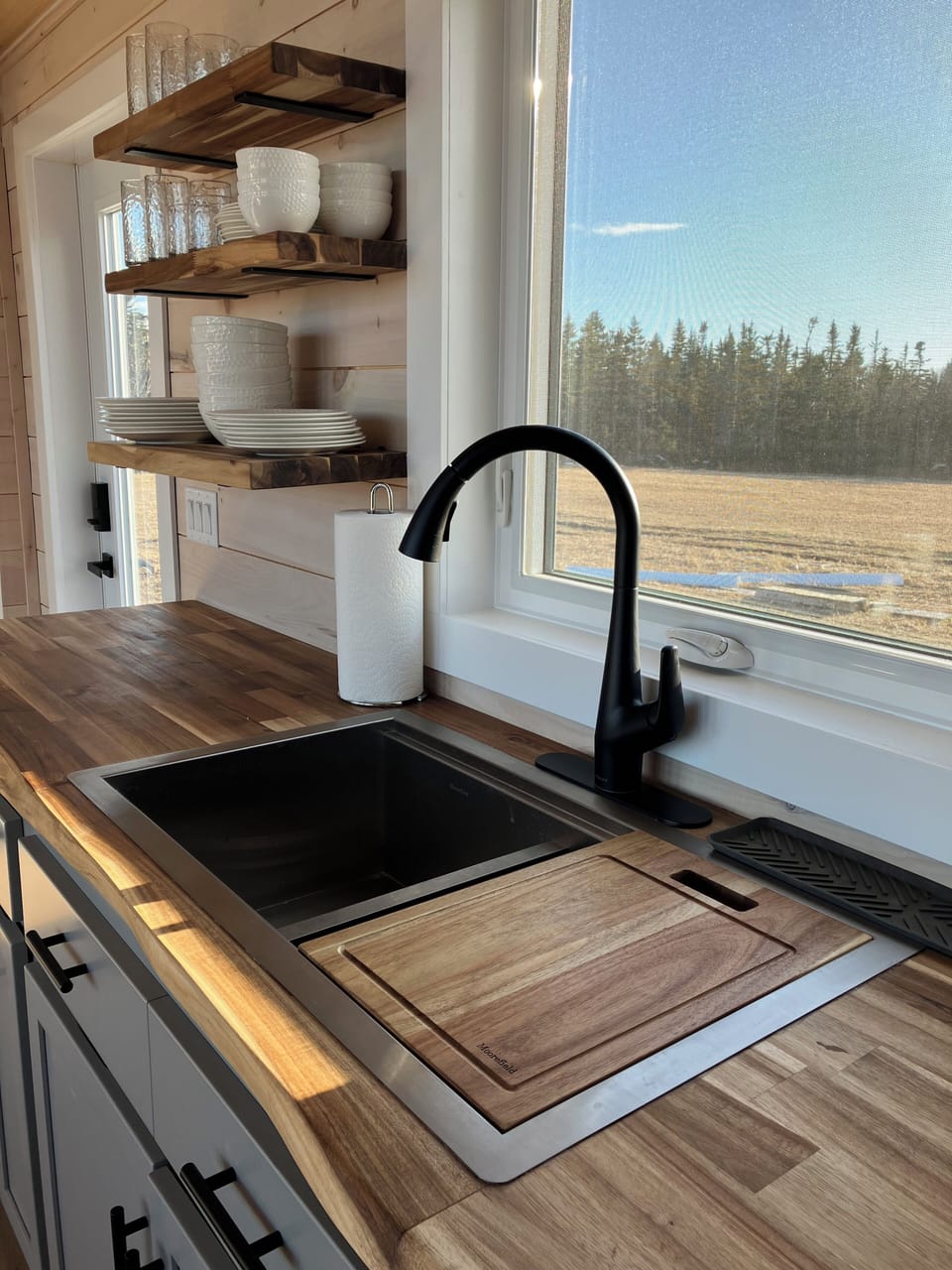 Full stocked kitchen including dinnerware, utensils, pots and pans