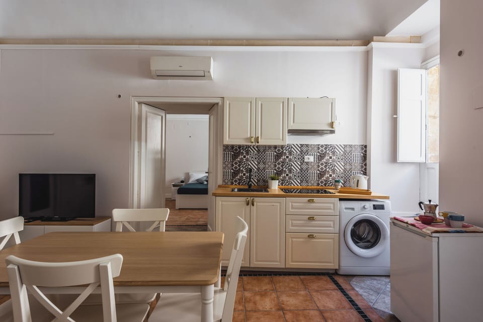 Apartment, Balcony | Private kitchen | Fridge, stovetop, electric kettle, cookware/dishes/utensils