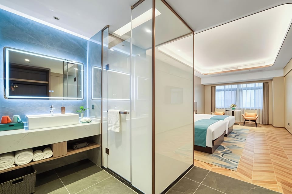 City Double Room, 1 Bedroom, City View | Bathroom | Shower, hair dryer, bathrobes, slippers