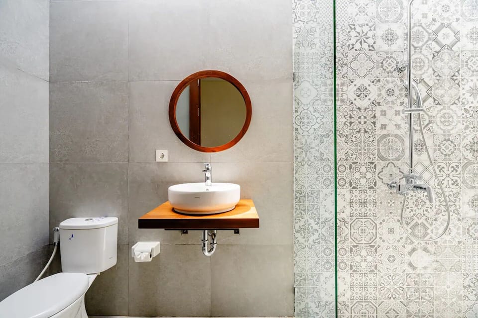 Shower, rainfall showerhead, towels, soap