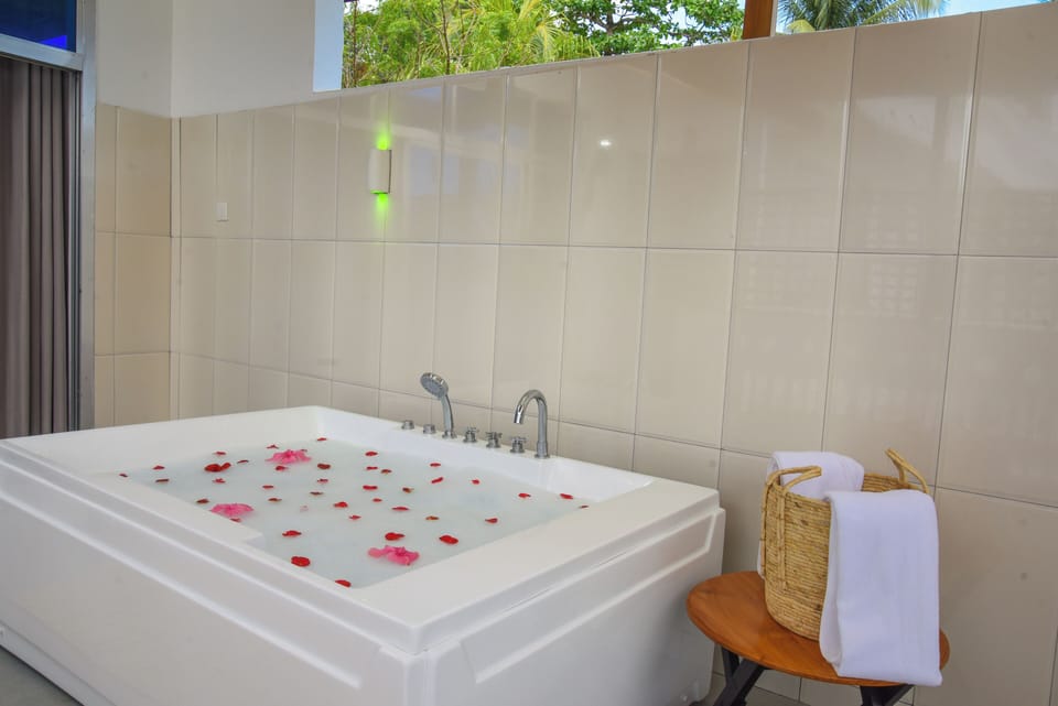 Honeymoon Double Room, Balcony, Sea View | Bathroom | Shower, free toiletries, hair dryer (on request), slippers