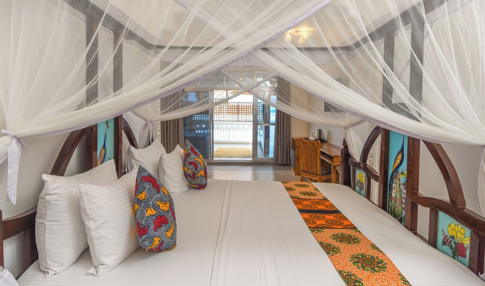 Honeymoon Double Room, Balcony, Sea View | Minibar, desk, laptop workspace, iron/ironing board
