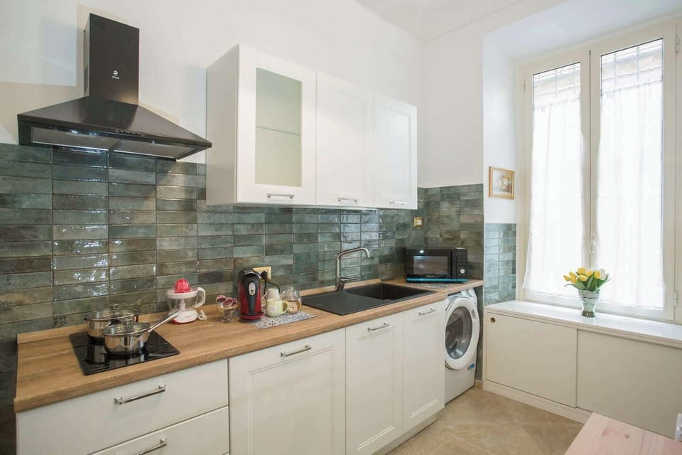 2 bedrooms and a living room with a sofa bed. | Private kitchen | Fridge, microwave, stovetop, dishwasher