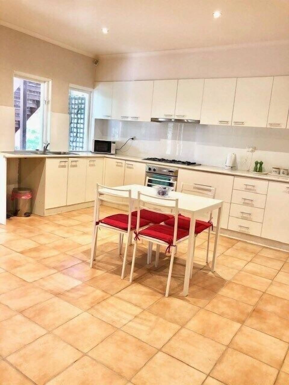 Furnished kitchen with dining facilities