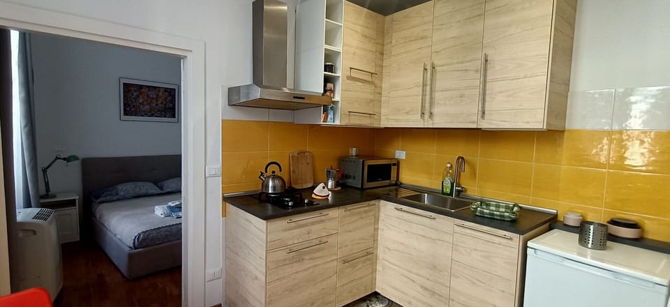 Modern kitchen of the holiday apartment in the heart of Rome.