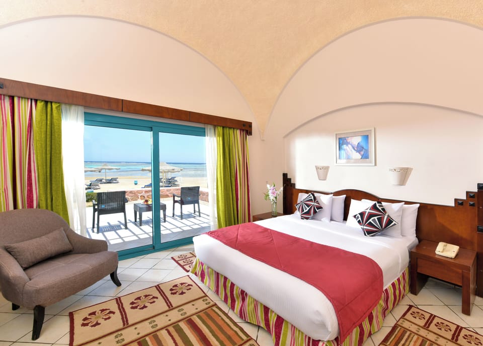 Egyptian cotton sheets, premium bedding, minibar, in-room safe