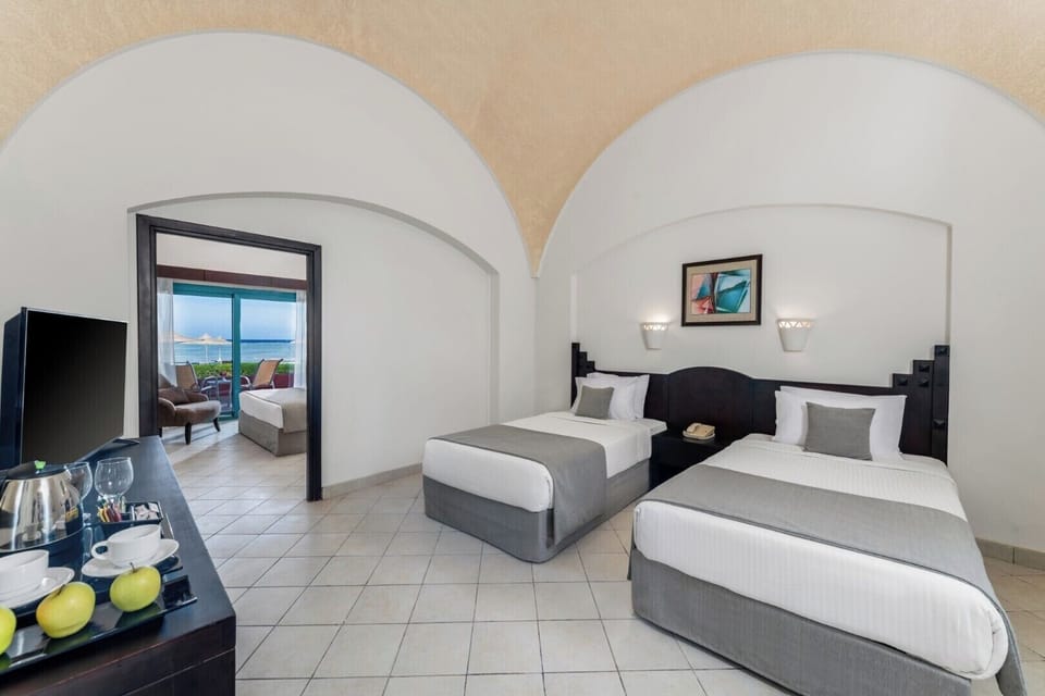 Family Room, Balcony, Pool View | Egyptian cotton sheets, premium bedding, minibar, in-room safe