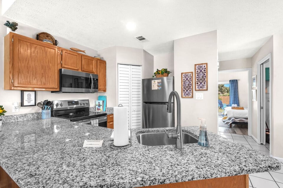 Enjoy the elegance of new Granite countertops for the open bar concept kitchen. As well as new stainless steel appliances throughout.