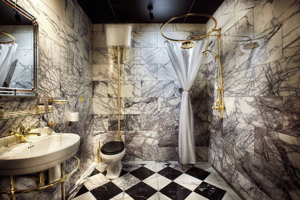 Presidential Suite | Bathroom | Separate tub and shower, hair dryer, towels, soap