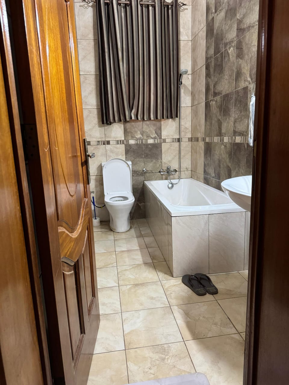 Slippers, towels, soap, toilet paper