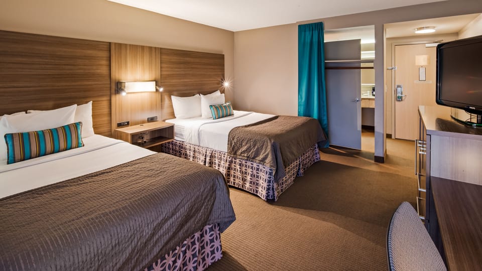 Traditional Room, 2 Queen Beds, City View | In-room safe, desk, blackout drapes, iron/ironing board