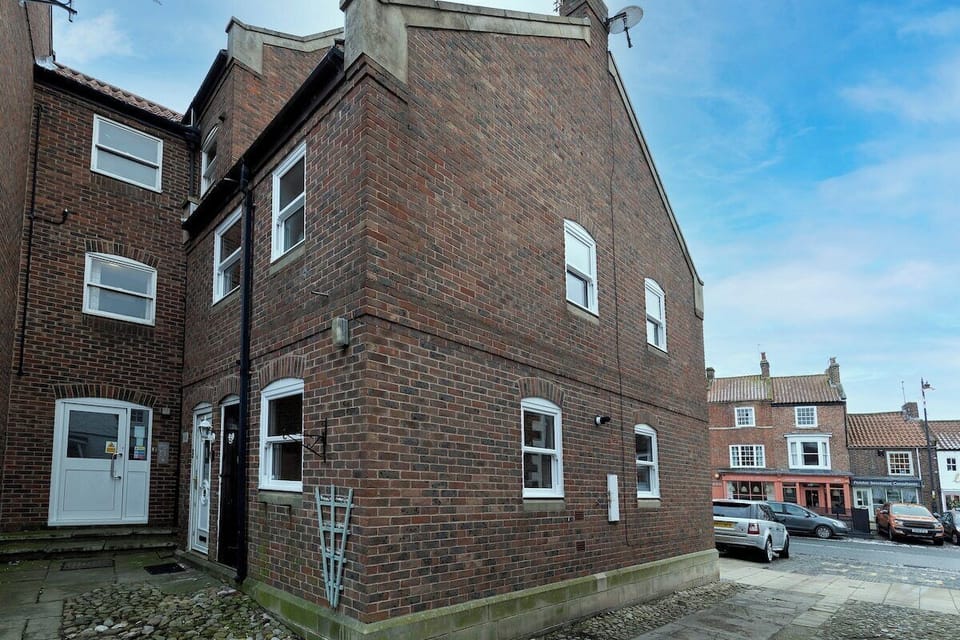 Entrance to the property just off the high street and located around the back 