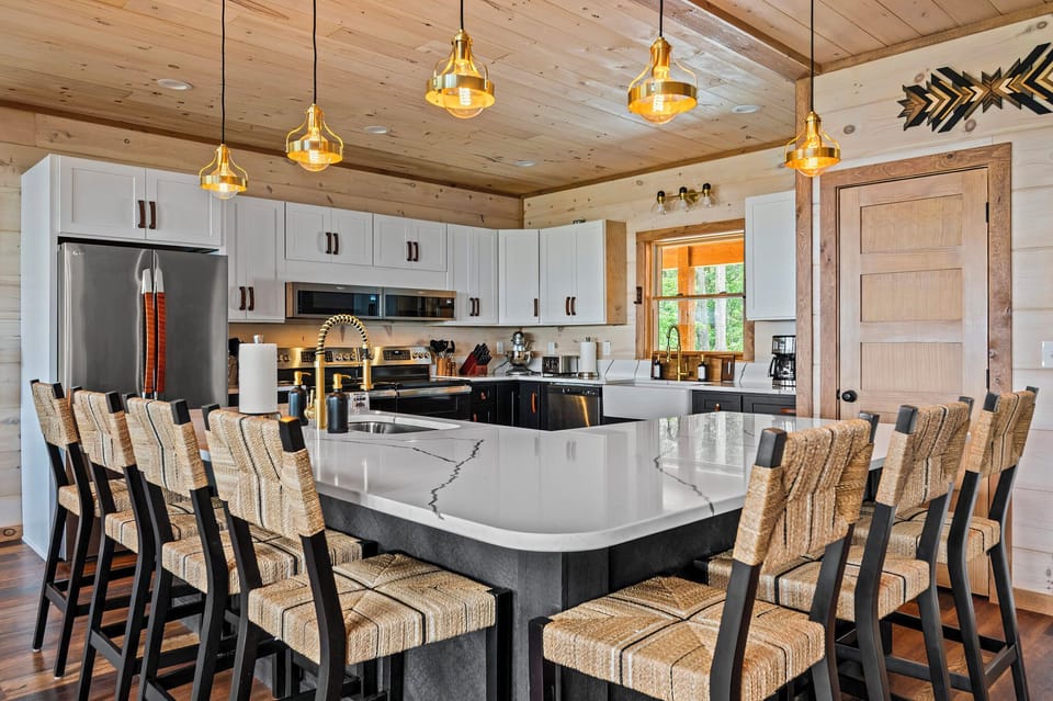 Kitchen- double ovens, crushed ice, and plenty of room for the family to gather.