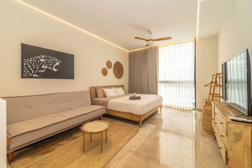 Relax and unwind in our cozy living room with a flat-screen TV