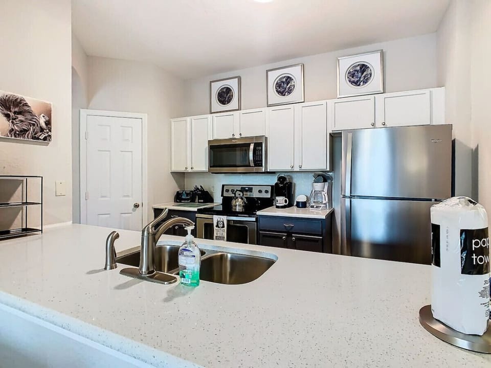 From the kitchen, enjoy a clear view into the living room, blending comfort and convenience in one open, inviting space.