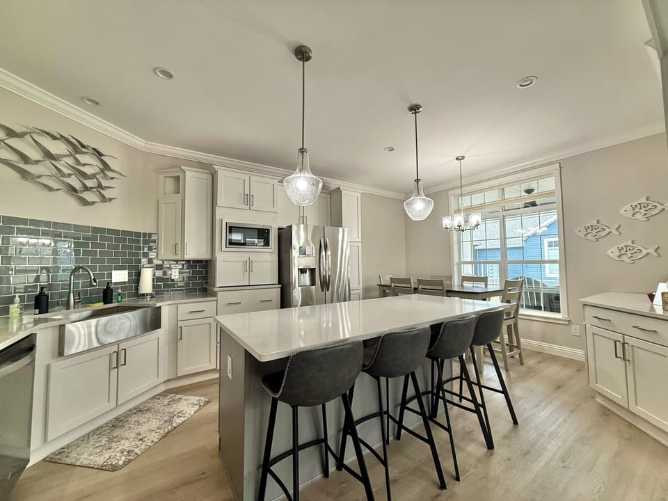Modern kitchen details with stainless steel appliances, ample storage, and clean finishes—everything you need for a seamless stay.