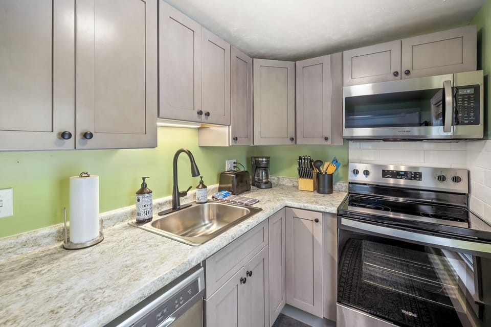 New fully renovated kitchen with stove, microwave and dishwasher