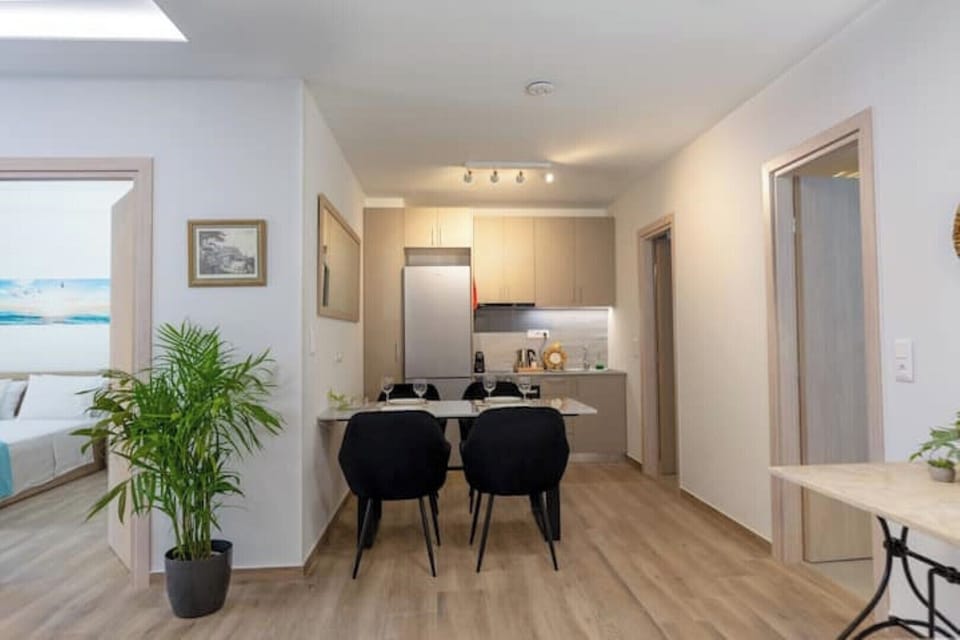 Dining area and fully equipped kitchen.
