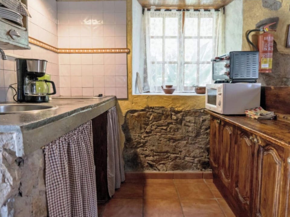 Villa | Private kitchen | Fridge, microwave, oven, stovetop
