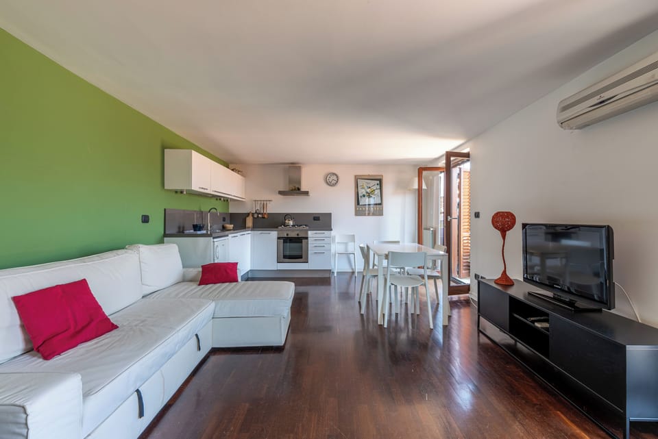 Apartment, City View | Living area | 35-inch TV with digital channels