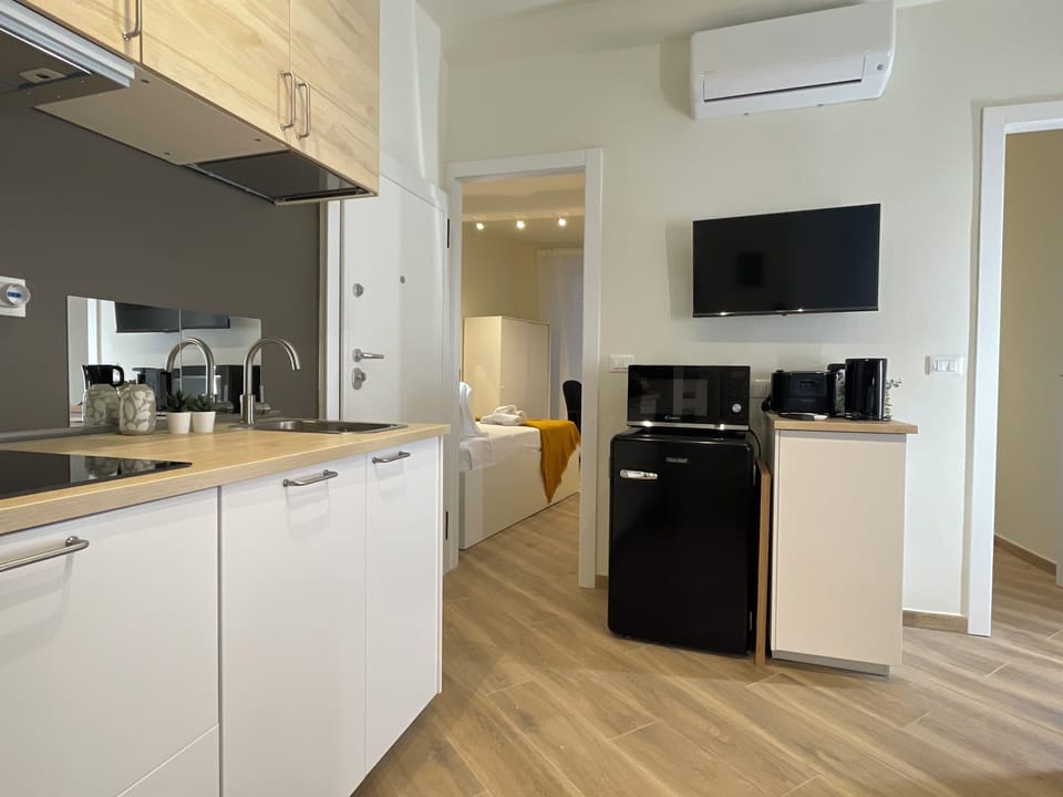 Family Apartment | Private kitchen | Fridge, microwave, stovetop, dishwasher