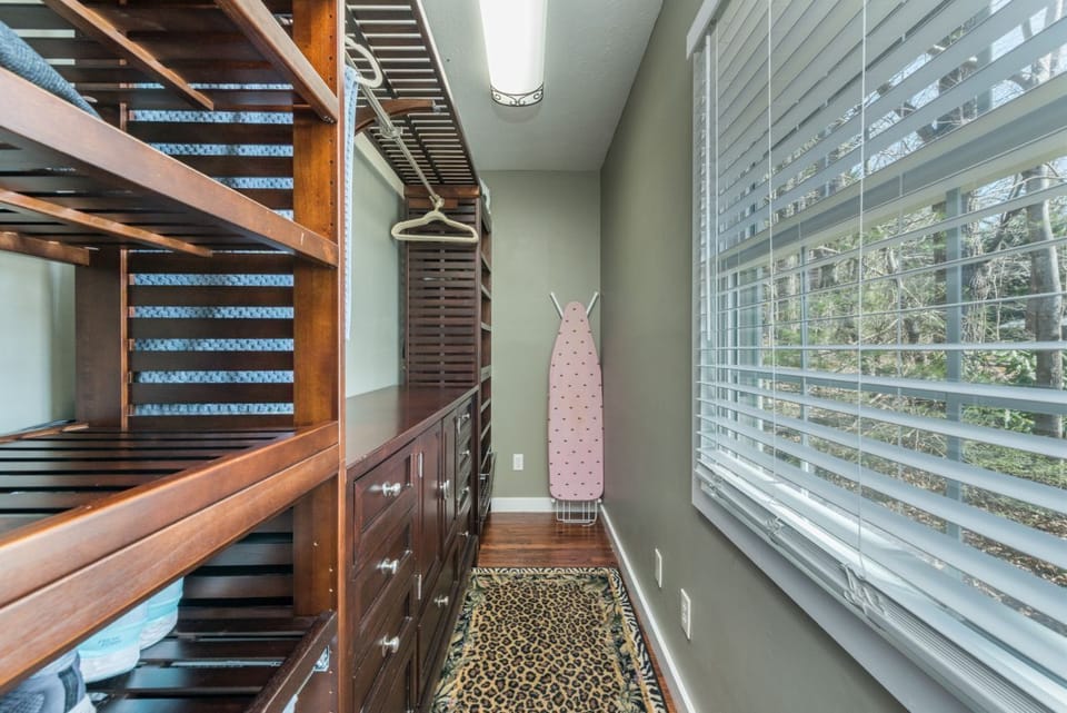 Walk-in closet in the primary bedroom.