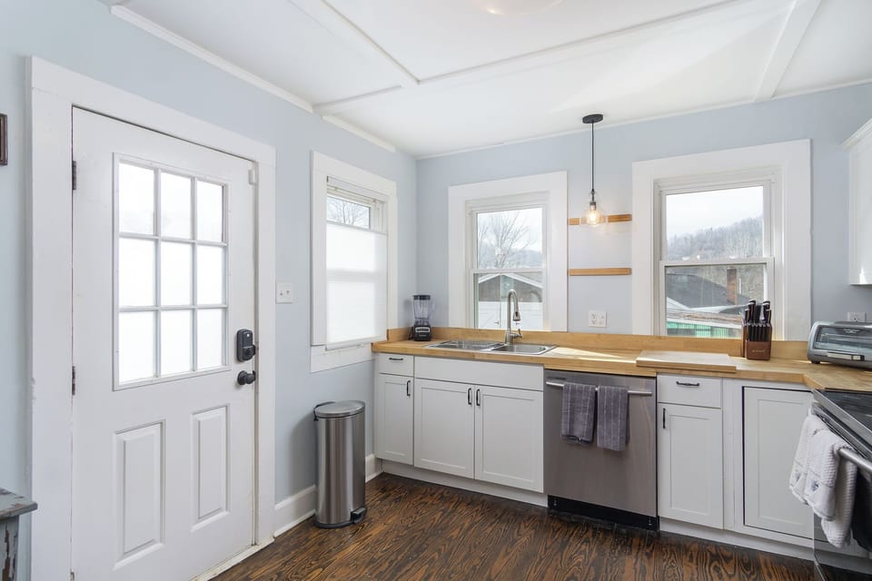 The main entrance leads into the kitchen.