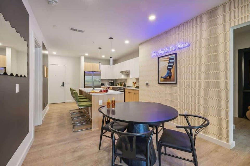 Dining table set to accommodate up to four guests.