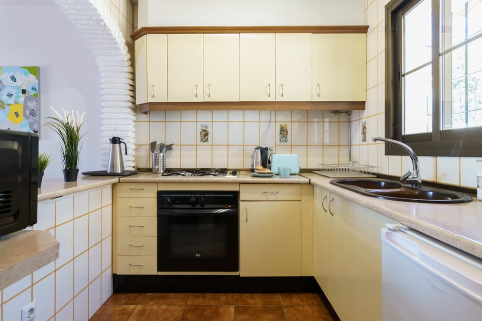 Standard Apartment, Multiple Bedrooms, Mountainside (Sunny Tranquility With Pool) | Private kitchen | Fridge, microwave, stovetop, coffee/tea maker