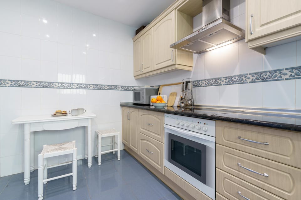 Honeymoon Apartment, Multiple Bedrooms, 2 Bathrooms (View Of The Sun Apartment With Pool) | Private kitchen | Fridge, microwave, oven, stovetop