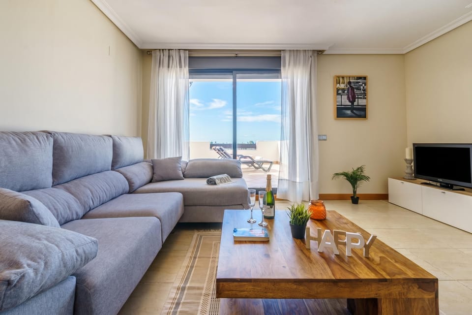 Family Apartment, Multiple Bedrooms, 2 Bathrooms, Mountainside (Sunset Seaview Corner With Pool) | Living area | 21-inch flat-screen TV with cable channels