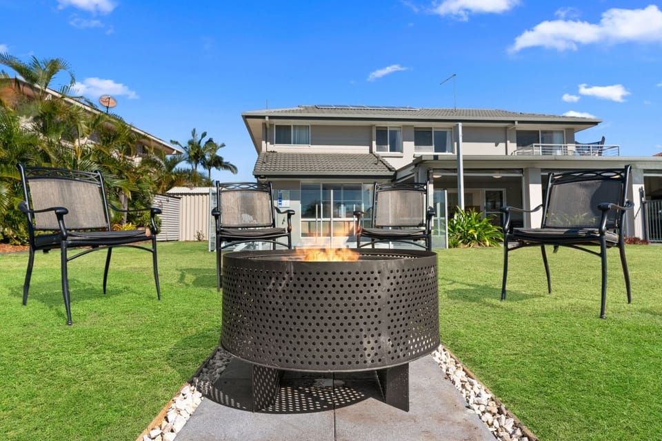 Seanna Blue is a waterfront home with large pool, heated spa, billiard table, large backyard, fire pit and a private pontoon for fishing and kayaking.