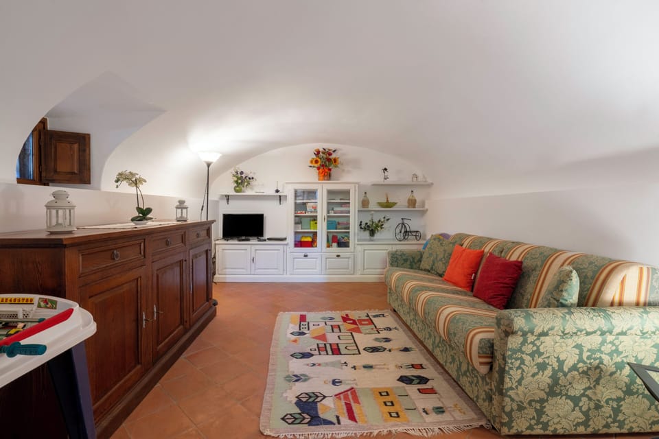 House, Courtyard View | Living area | 32-inch flat-screen TV with satellite channels