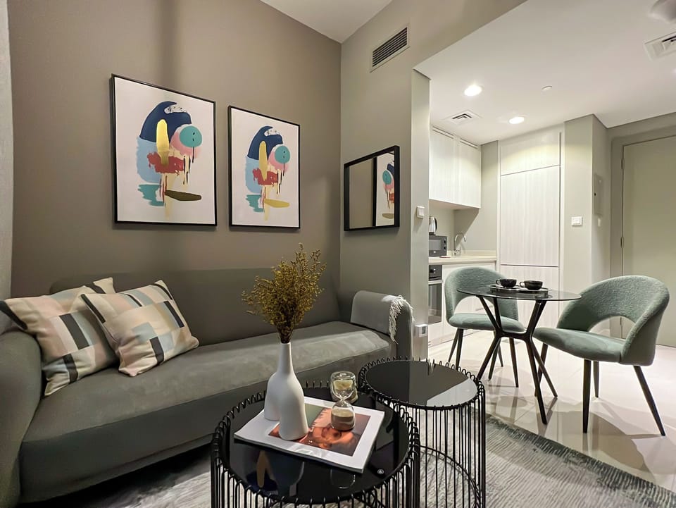 Deluxe Apartment, Balcony, Lake View | Living area | 50-inch Smart TV with digital channels