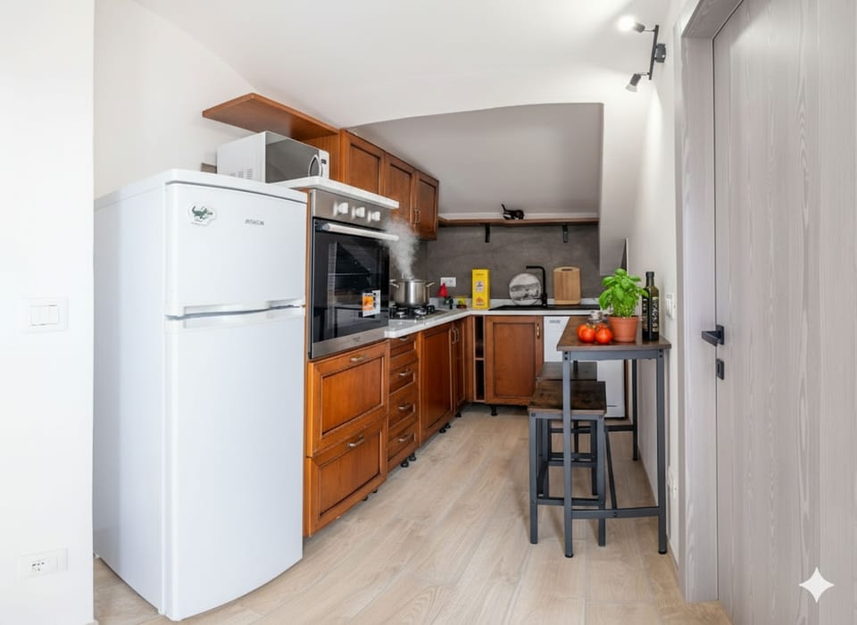 City Condo | Private kitchen | Full-size fridge, microwave, oven, stovetop