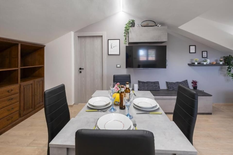 City Condo | Living area | 49-inch Smart TV with digital channels