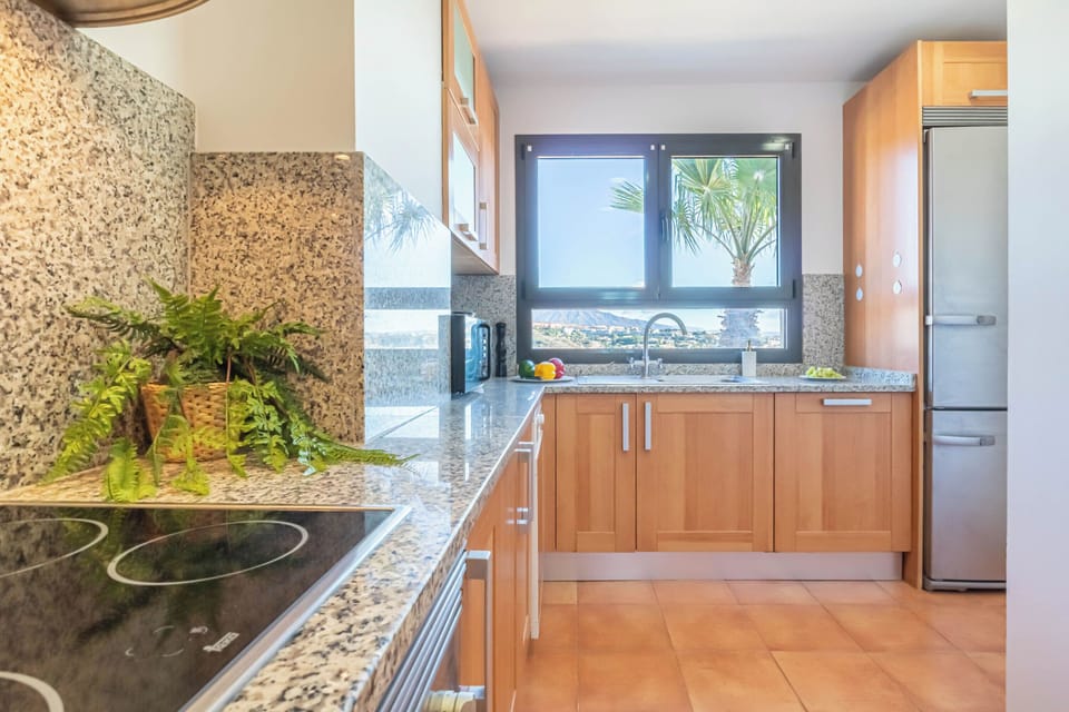Family Apartment, Multiple Bedrooms, 2 Bathrooms, Mountainside (Sunset Golf International) | Private kitchen | Fridge, microwave, oven, stovetop