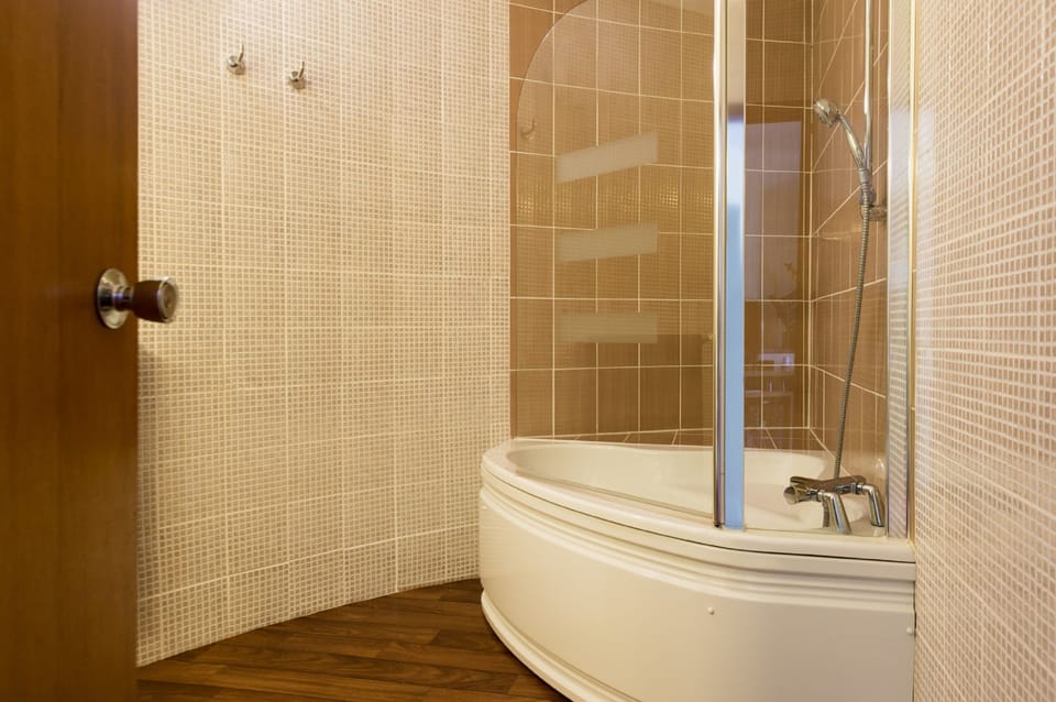 Signature Double Room | Bathroom | Eco-friendly toiletries, hair dryer, slippers, towels