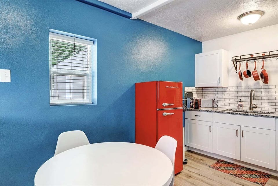 Refrigerator and dining table seating area