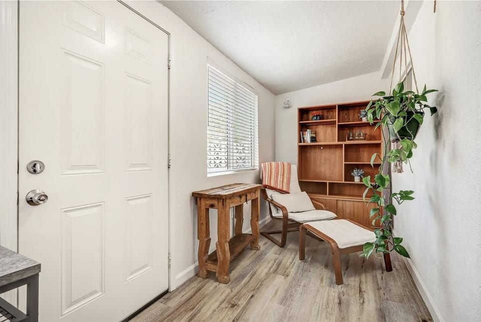 Entryway with separate seating area and great natural lighting